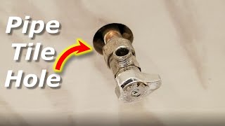 How to Cut Round Holes in Tile for PipesShower Heads [upl. by Llenoil]