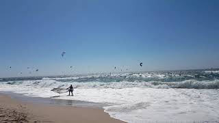 Kitesurfers at Praia do Guincho Portugal [upl. by Ahsinek]