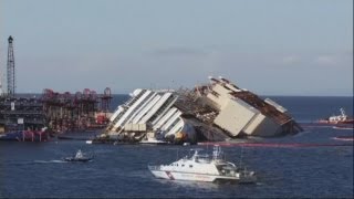 Costa Concordia time lapse Wrecked ship is pulled off rocks in Italy [upl. by Atinav268]