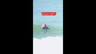 Surfing Santas at Cocoa Beach 🌊🎅 [upl. by Suzetta]