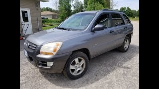 2005 Kia Sportage LX 27L Oil Change [upl. by Nrobyalc]