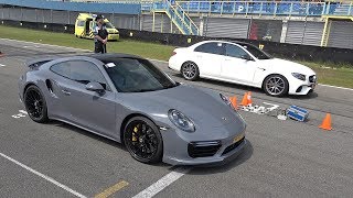 Porsche 991 Turbo S vs RENNtech MercedesAMG E 63 S [upl. by Kcyrred475]