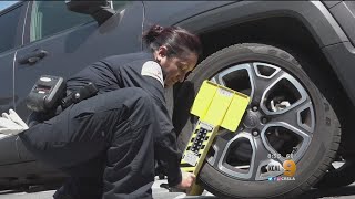 HighTech Parking Boot Gets Ticket Scofflaws Back In The Drivers Seat [upl. by Cia125]