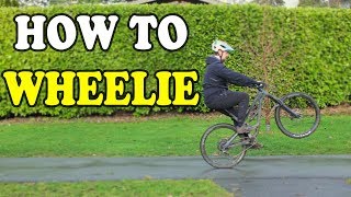 How to Wheelie a Mountain Bike in 5 Steps FOR BEGINNERS [upl. by Nyletak]