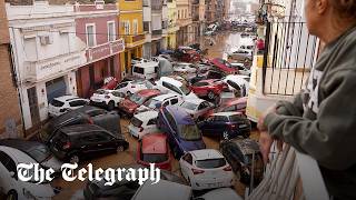 Spain flash floods Dozens dead as cars pile up in Valencia [upl. by Neitsirk]