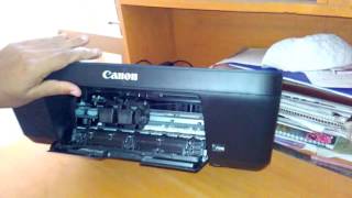 How to replacechangeopen ink cartridge from canon pixma E400 printer [upl. by Kinata568]