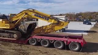 Globe Trailers 55 Ton Lowboy w Hydraulic Flip axle on job site [upl. by Molli463]