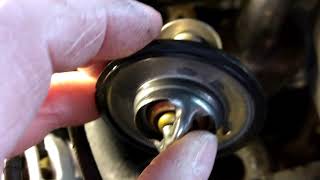 Replacing the thermostat on a 2002 GMC Sonoma 4 3 L V6 [upl. by Toms421]