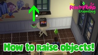 How to raise and lower objects in The Sims 4 on PS4 [upl. by Novaat564]