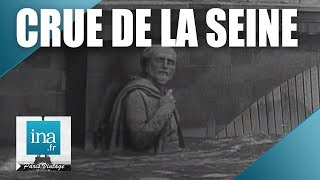 1955  Les inondations à Paris et en France  Archive INA [upl. by Naruq942]