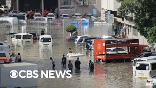 Videos show Dubai streets flooded after record rainfall inundates UAE [upl. by Artenak]