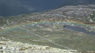 Rainbow seen from above Gaustatoppen Norway [upl. by Aeslahc]