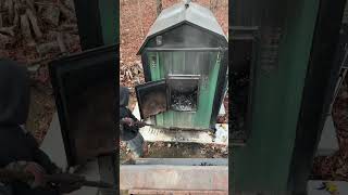 Cleaning out the wood boiler woodboiler woodstove homeheating [upl. by Ernie999]