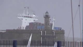 Container ship entering Leixoes harbour in a storm north of Portugal [upl. by Tirza]