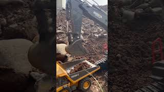 RC Construction Huina 1592 Excavator Digger And Working [upl. by Arahsit717]