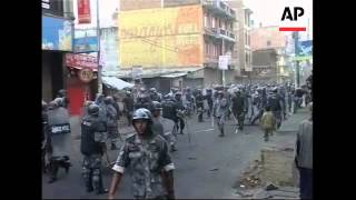 Protestors and police clash in latest violence [upl. by Haissi129]