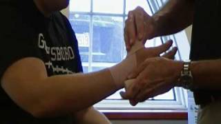 How To Wrap An Elastic Bandage Thumb Sprain [upl. by Enywad]