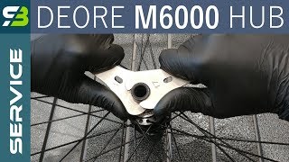 How To Service Shimano Deore M6000 Rear Hub Disassembly Greasing Assembly [upl. by Lladnek]