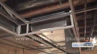 Installing Ceiling Drops For A Dropped or Suspended Ceiling [upl. by Nai]