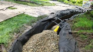 How to Build a French Drain System Around a Tree [upl. by Fogarty176]