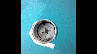 Repair damage around recessed light can light [upl. by Anirdnajela]