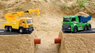 Construction vehicles repair the road  Excavator crane truck and dump truck for kids  BIBO TOYS [upl. by Aroz]