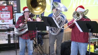 Musicians Greet Kroger Customers With Holiday Carols [upl. by Tap]