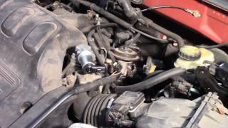 Idle Air Control Valve IAC Installation  Ford Escape 30L [upl. by Sivatco]