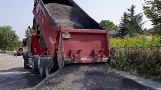 Kenworth T880 Dump Truck Dumping Gravel Load Tailgate BANG [upl. by Ibbob]