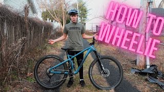 How To Wheelie A Mountain Bike Easy Way [upl. by Scrivens]