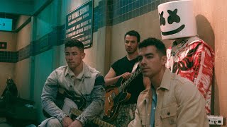 Marshmello x Jonas Brothers Leave Before You Love Me Behind The Scenes [upl. by Kacerek]