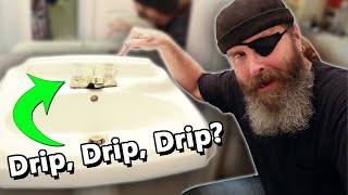 How to Fix a Dripping Bathroom Sink Faucet Double Handle [upl. by Kinimod]