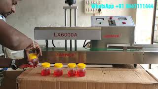 Automatic Induction wad sealing machine Induction foil sealing machine [upl. by Plotkin606]