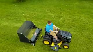 AgriFab 450546 52quot TowBehind Lawn Sweeper [upl. by Enylhsa]