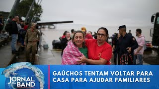 Gaúchos tentam voltar para casa para ajudar familiares  Jornal da Band [upl. by Varden]