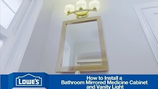 How To Install a Bathroom Vanity Mirror amp Light [upl. by Chilson694]