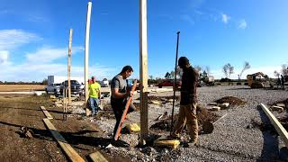 How to set poles for pole barn [upl. by Atirehgram645]