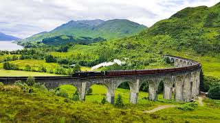 The quotHogwarts Expressquot over the quotHarry Potter Bridgequot aka the Glenfinnan Viaduct in Scotland [upl. by Orban335]