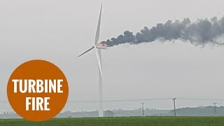 A wind turbine catches fire after thunder and lightening strikes [upl. by Radcliffe313]