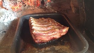 Costillar de cerdo en horno de leña [upl. by Anay]