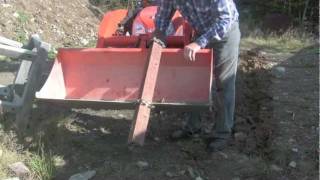 Homemade trencher for tractor bucket on Kubota BX [upl. by Aninay]