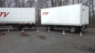 LKW Fahrschule Grundfahraufgabe Gliederzug rückwärts um Kurve schieben [upl. by Alleul]