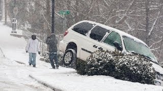 Atlanta commuters stranded in cars after snowfall [upl. by Ahsinev]