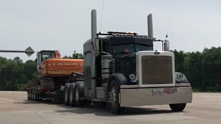 Peterbilt heavy haul truck with NEW 2020 trail king lowboy [upl. by Nylyrehc625]