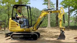 Cat® Mini Excavator Operating Tips Blade Positioning [upl. by Neelyt348]