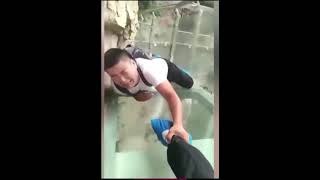 Hilarious reactions of people on the glass bridge with cracking effect [upl. by Annahsed]