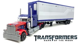 Transformers DOTM Optimus Prime W MechTech Trailer Unboxing amp Review [upl. by Alletnahs474]