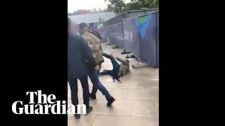 Tommy Robinson filmed punching man outside England match in Portugal [upl. by Reger]