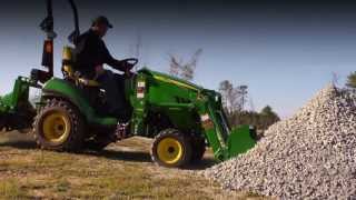 John Deere QuikPark™ Loader  1025R vs Kubota BX [upl. by Nangatrad]