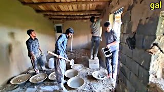 Continuing cooperation of skilled plasterers with a nomadic man to plaster the house [upl. by Ettennod]